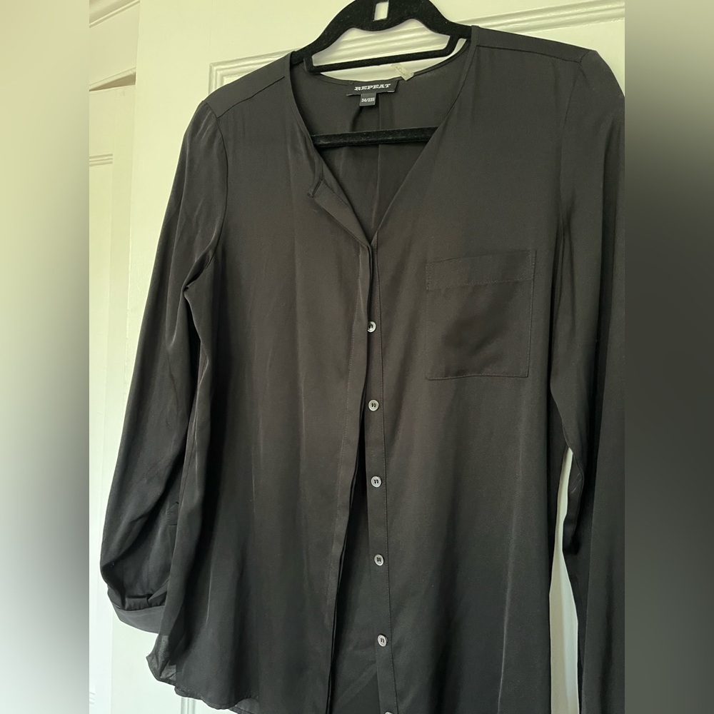 REPEAT  silk blouse.